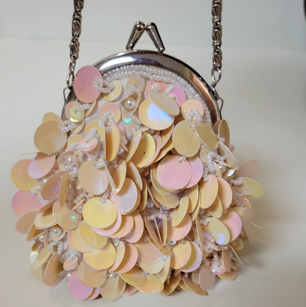 Small clutch purse with pink sequins 5" X 5"